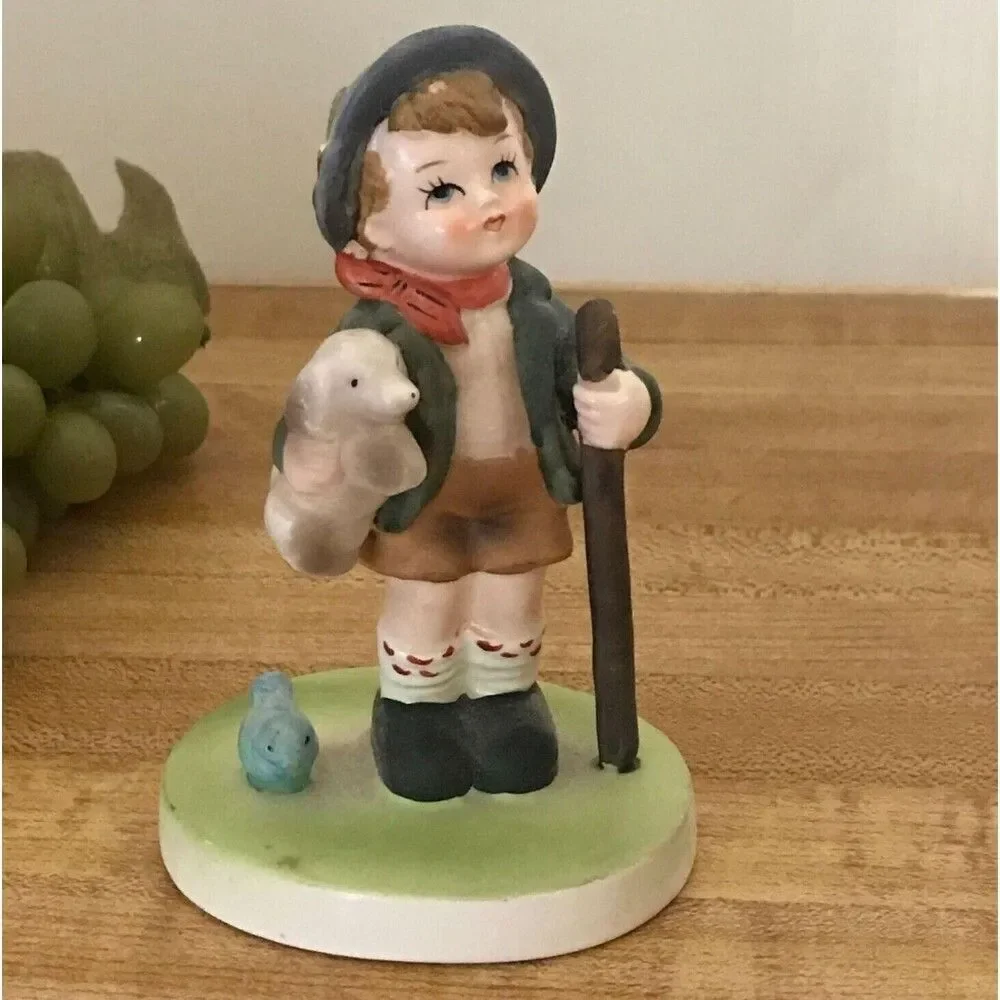 #1090 Flambro Porcelain Vintage boy with dog figurine